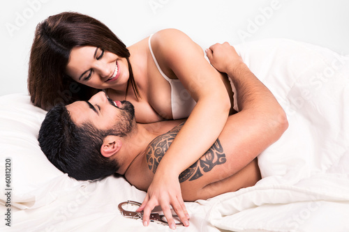 Photo: Love couple in bed Love couple in bed