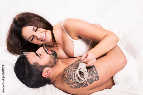Photo: Love couple in bed Love couple in bed