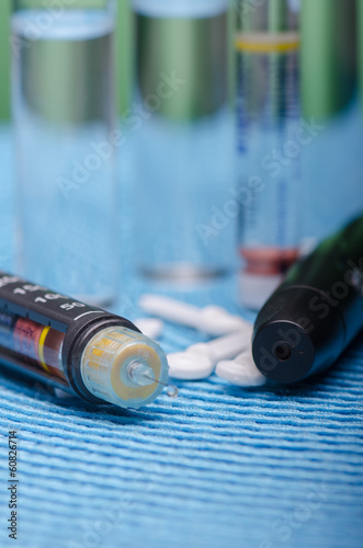 Photo: Insulin pen, vials and pills Insulin pen, vials and pills
