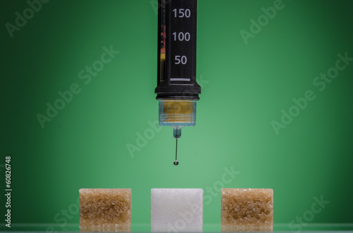 Photo: Insulin pen and sugar cubes Insulin pen and sugar cubes