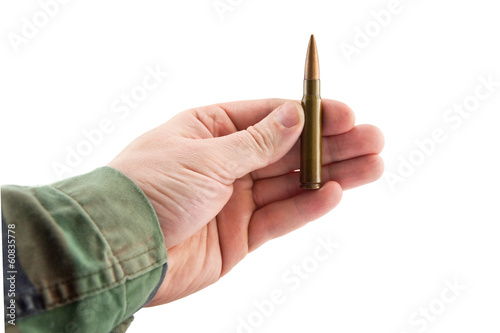 Photo: Hand showing a cartridge Hand showing a cartridge