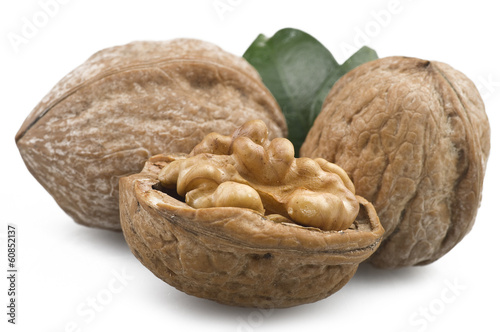 Photo: Walnuts group close up on the white Walnuts group close up on the white