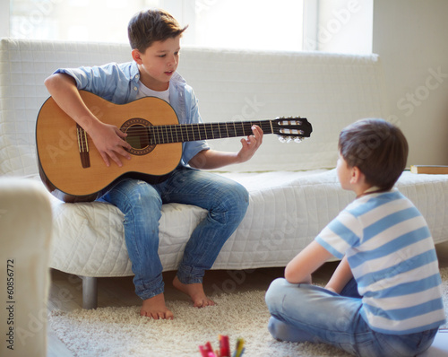 Photo: Learning how to play the guitar Learning how to play the guitar