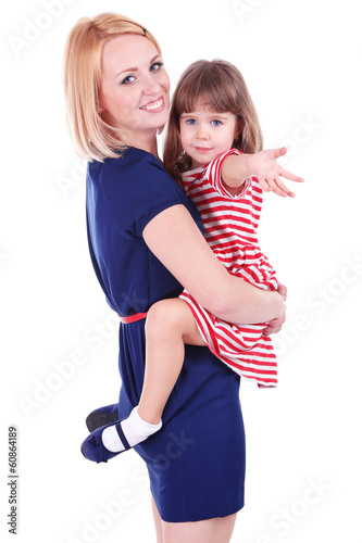 Photo: Pretty little girl with mother isolated on white Pretty little girl with mother isolated on white