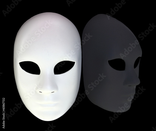 Photo: White mask with reflection on black background White mask with reflection on black background