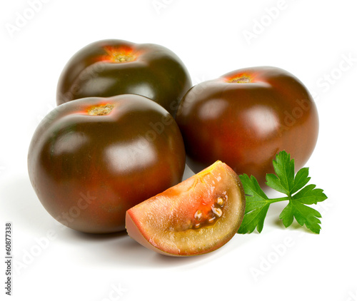 Photo: kumato tomatoes isolated on white background kumato tomatoes isolated on white background