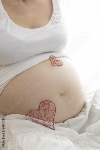 Photo: Babybauch mit 2 Herzen Babybauch mit 2 Herzen