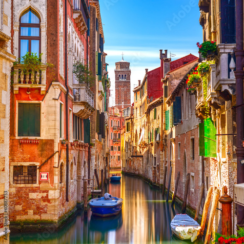 Venice cityscape, water canal, campanile church and traditional