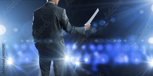 Photo: Business man on stage Business man on stage