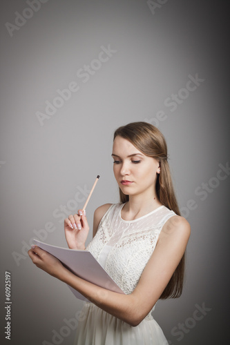 Photo: Girl in white. Concentration. Girl in white. Concentration.