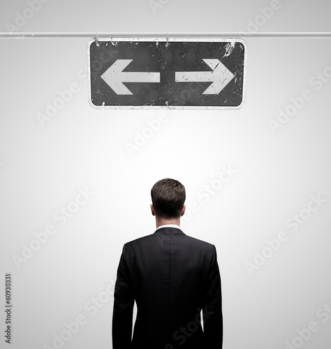 Photo: man looking at pointer man looking at pointer