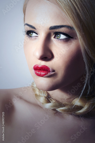 Photo: Beautiful Blond Woman with Heart on Lips.Make-up.Freak Girl Beautiful Blond Woman with Heart on Lips.Make-up.Freak Girl