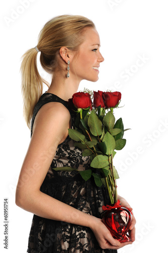 Photo: Young Woman Holding Vase with Roses Young Woman Holding Vase with Roses