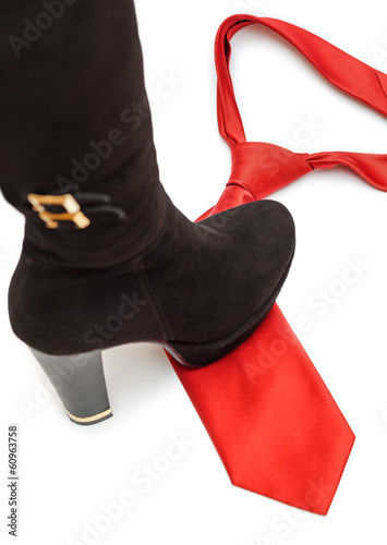 Photo: Shoe steps on a necktie Shoe steps on a necktie