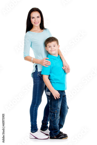 Photo: Full portrait of a happy young mother with son Full portrait of a happy young mother with son