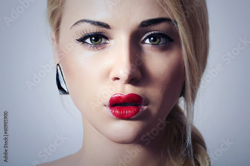 Photo: Beautiful Blond Woman with Unusual Make-up.Freak Girl Beautiful Blond Woman with Unusual Make-up.Freak Girl
