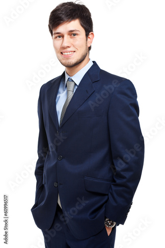 Photo: Smiling businessman isolated on white Smiling businessman isolated on white