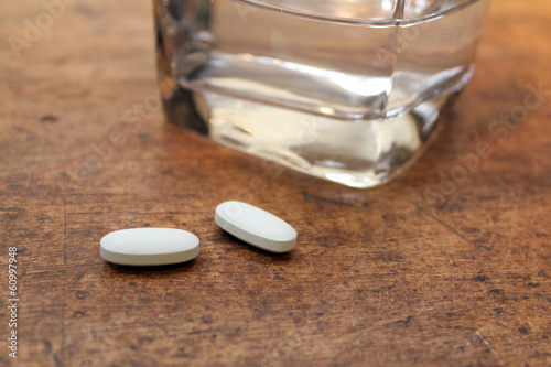 Photo: pills and water pills and water