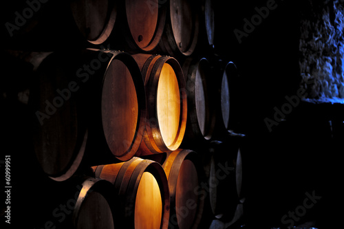 Fototapeta Barrel of wine in winery.