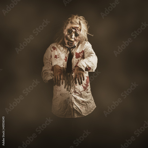 Photo: Evil zombie business woman. Mindless follower Evil zombie business woman. Mindless follower