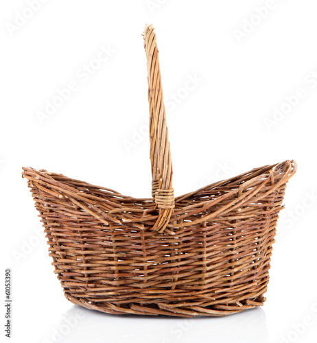 Photo: Empty wicker basket, isolated on white Empty wicker basket, isolated on white