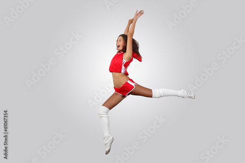 Photo: Young female dancer against white background Young female dancer against white background