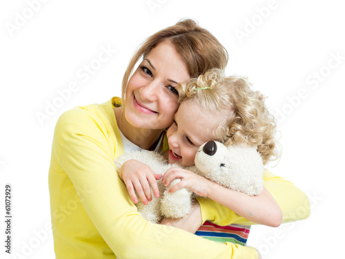 Photo: mother playing with her kid girl and plush toy mother playing with her kid girl and plush toy