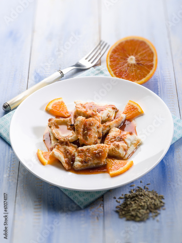 Photo: salted cod with orange juice and fennel seeds, selective focus salted cod with orange juice and fennel seeds, selective focus