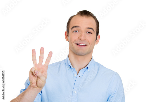 Photo: Business man giving three fingers with his hand Business man giving three fingers with his hand