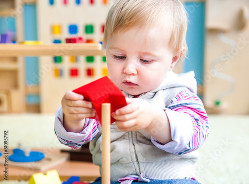 Photo: little girl in the classroom early development little girl in the classroom early development