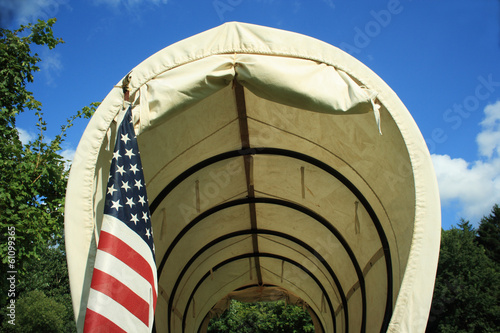 Photo: Covered Wagon With Flag Covered Wagon With Flag