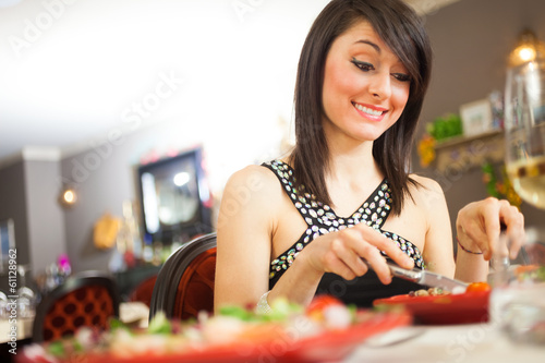 Photo: Woman having dinner Woman having dinner