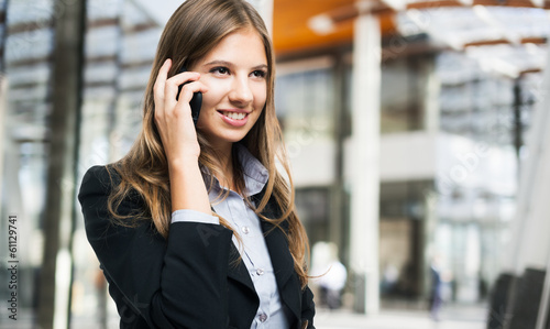 Photo: Businesswoman talking on the phone Businesswoman talking on the phone