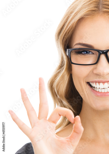 Photo: Businesswoman with okay gesture, isolated Businesswoman with okay gesture, isolated