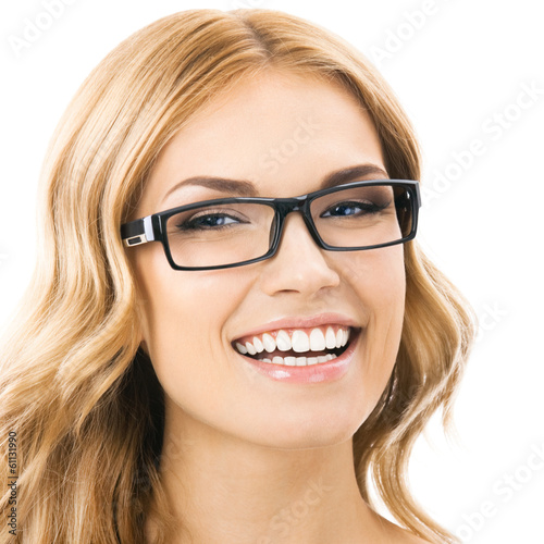 Photo: Cheerful smiling woman in glasses, isolated Cheerful smiling woman in glasses, isolated