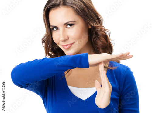Photo: Woman showing heart symbol gesture, isolated Woman showing heart symbol gesture, isolated