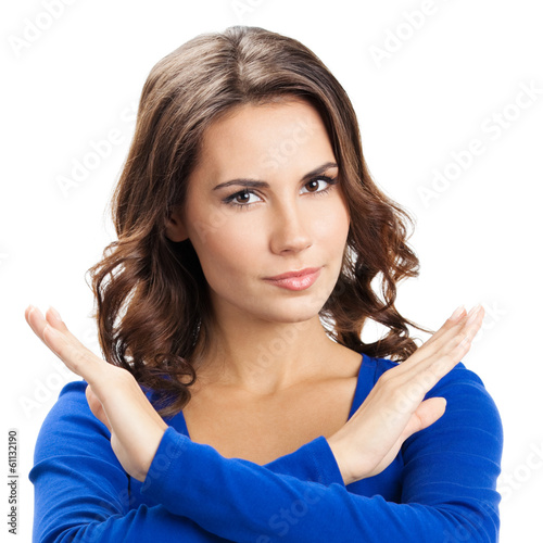 Photo: Serious woman with stop gesture, isolated Serious woman with stop gesture, isolated