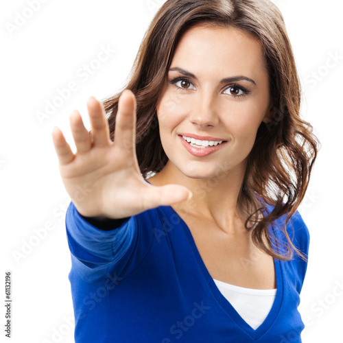Photo: Woman with stop gesture, isolated Woman with stop gesture, isolated