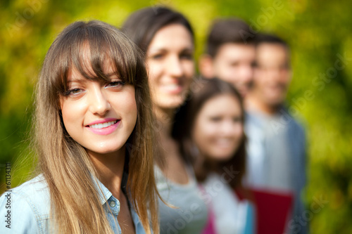 Photo: Smiling students at the park Smiling students at the park