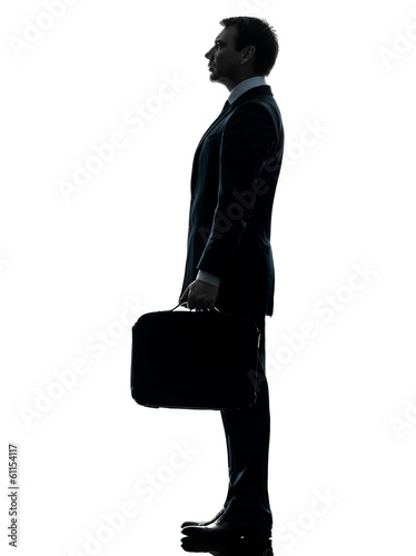 Photo: business man standing proflie silhouette business man standing proflie silhouette