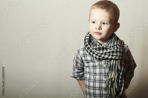 Photo: Child. funny little boy in scurf. Fashion Children. 4 years old Child. funny little boy in scurf. Fashion Children. 4 years old