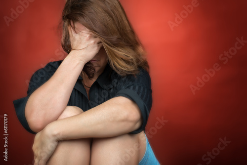 Photo: Young woman crying (with space for text) Young woman crying (with space for text)