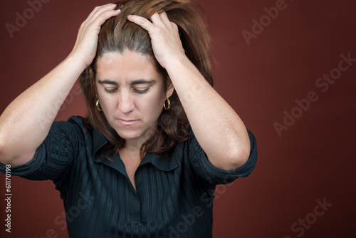 Photo: Portrait of a desperate stressed hispanic woman Portrait of a desperate stressed hispanic woman