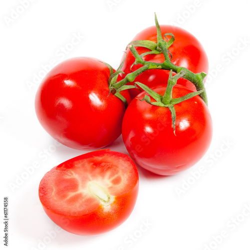 Photo: Fresh tomatoes isolated on white Fresh tomatoes isolated on white