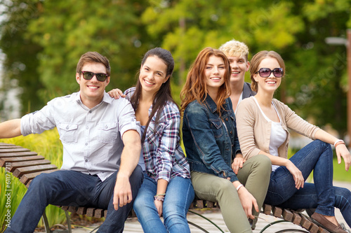 Photo: group of students or teenagers hanging out group of students or teenagers hanging out