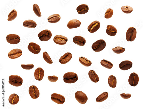 Photo: Falling black coffee grain, bean on white background Falling black coffee grain, bean on white background