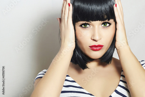 Photo: Beautiful Brunette Woman. Black Hair Girl.Fringe.Red Lips Beautiful Brunette Woman. Black Hair Girl.Fringe.Red Lips
