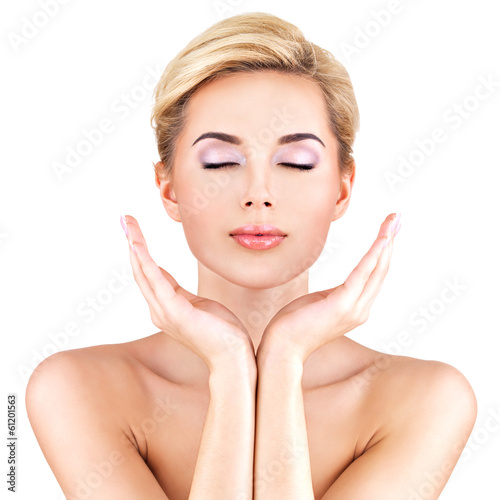 Photo: Beauty face of the young beautiful woman Beauty face of the young beautiful woman