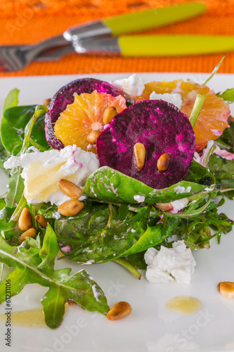 Photo: fresh salad with roasted beetroot, white cheese, orange and pine fresh salad with roasted beetroot, white cheese, orange and pine