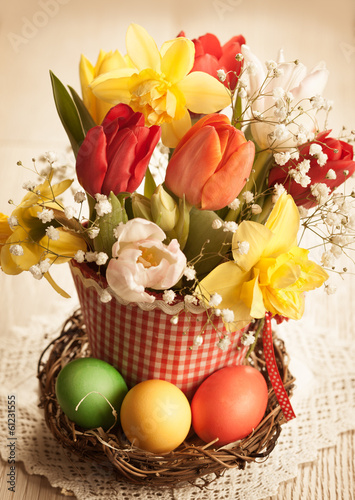 Photo: Spring flowers and Easter eggs in vintage style Spring flowers and Easter eggs in vintage style